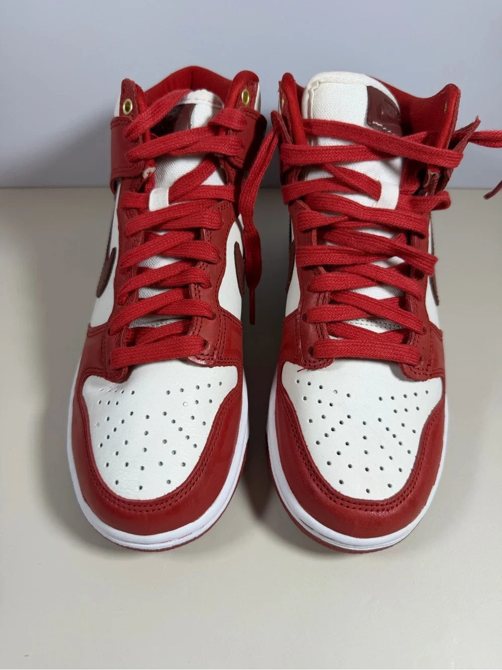 Nike Men’s Red and White High-Top Sneakers with Dark Red Swoosh